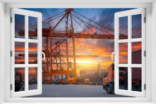 Fototapeta Naklejka Na Ścianę Okno 3D - Crane loading cargo container freight container ship in the international terminal logistics sea port concept freight shipping by ship, Truck running in port under the Big Crane transport.