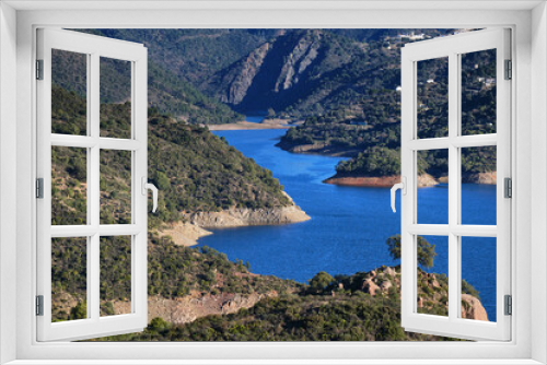Fototapeta Naklejka Na Ścianę Okno 3D - Views of the Istan reservoir to Marbella from the top of the Sierra Blanca shell