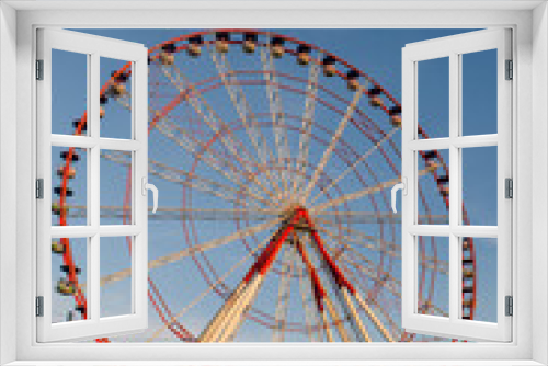 Fototapeta Naklejka Na Ścianę Okno 3D - Attraction ferris wheel in the city, mountains and blue sky, vertical
