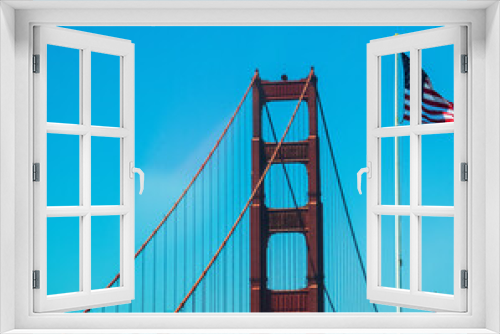 Fototapeta Naklejka Na Ścianę Okno 3D - Golden Gate Bridge with flag