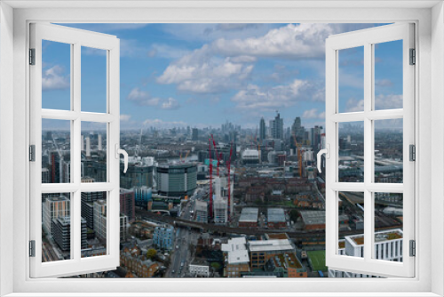 Fototapeta Naklejka Na Ścianę Okno 3D - Aerial London Skyline view near Battersea Power Station in London. Cloudy weather over London.