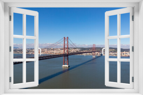Fototapeta Naklejka Na Ścianę Okno 3D - Landscape of the April 25 bridge between Almada and Lisbon - Portugal