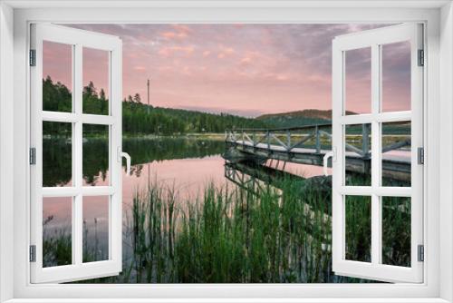 Fototapeta Naklejka Na Ścianę Okno 3D - Peaceful landscape of Lake Inari with the midnight sun in Lapland, Finland