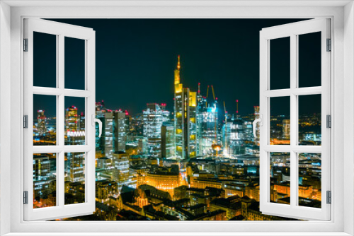 Fototapeta Naklejka Na Ścianę Okno 3D - high angle view of the illuminated city skyline at night, frankfurt main, germany