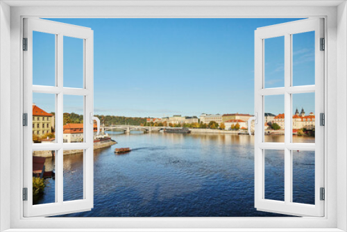 Fototapeta Naklejka Na Ścianę Okno 3D - Panoramic view of pleasure boat on the Vltava river in Prague.