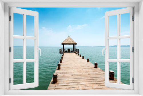 Fototapeta Naklejka Na Ścianę Okno 3D - Wooden jetty over the beautiful Maldivian sea with blue sky
