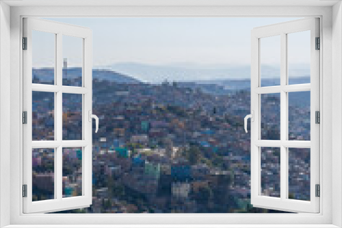 Fototapeta Naklejka Na Ścianę Okno 3D - Very beautiful view of the city at sunset in the Mexican city of Guanajuato surrounded by large mountains.