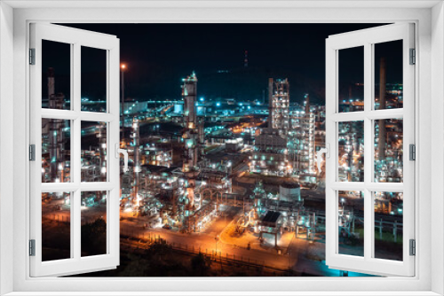 Fototapeta Naklejka Na Ścianę Okno 3D - industrial area production plant or refinery crude oil and gas for transportatioon and export, aerial photography at night scene from drone,