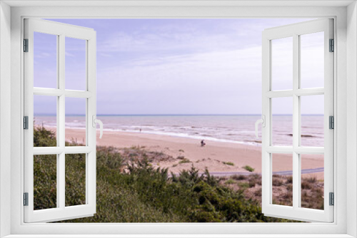 Fototapeta Naklejka Na Ścianę Okno 3D - View to a beach, sea and blue sky