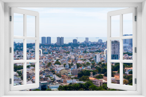 Fototapeta Naklejka Na Ścianę Okno 3D - Morning in Vung Tau seen from above, with the most beautiful sea waves, coastline, streets, buidling, coconut trees and Tao Phung mountain in Vietnam. Travel concept.