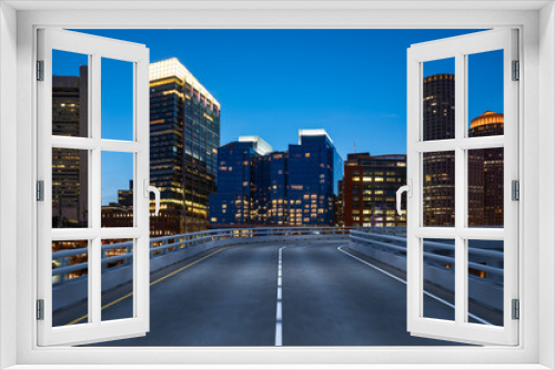 Fototapeta Naklejka Na Ścianę Okno 3D - Empty urban asphalt road exterior with city buildings background. New modern highway concrete construction. Concept of way to success. Transportation logistic industry fast delivery. Boston. USA.