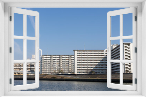 Fototapeta Naklejka Na Ścianę Okno 3D - 大阪・神崎川の横の集合住宅（2023年2月23日撮影）