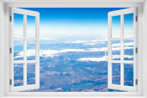 Fototapeta Naklejka Na Ścianę Okno 3D - Beautiful earth and sea from a window airplane background
