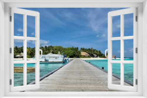 Fototapeta Naklejka Na Ścianę Okno 3D - Paradise. Maldivian tropical island. Blue water, beach with palms and ship