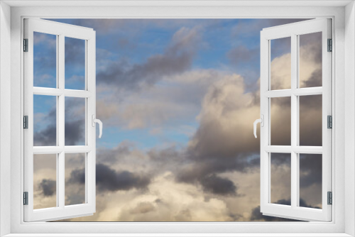 grey and white clouds on blue sky background