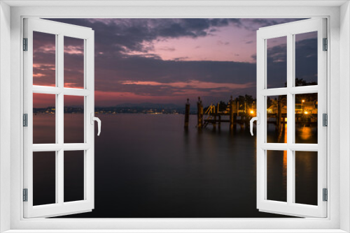 Fototapeta Naklejka Na Ścianę Okno 3D - Evening in the resort of Sirmione on Lake Garda