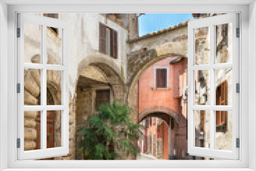 Fototapeta Naklejka Na Ścianę Okno 3D - Pretty street in the ancient city of Tuscany