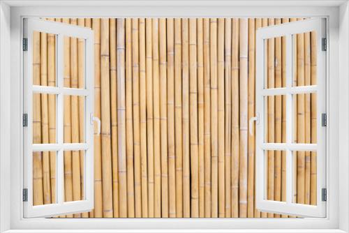 Fototapeta Naklejka Na Ścianę Okno 3D - Yellow bamboo texture. Dried bamboo wall or fence background
