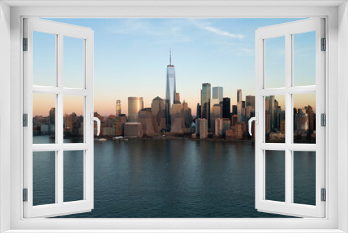 Fototapeta Naklejka Na Ścianę Okno 3D - Skyline of Manhattan and Hudson River on sunset - drone photography