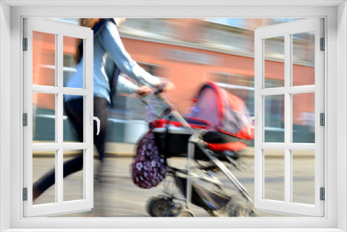 Mother walks with the child in the stroller