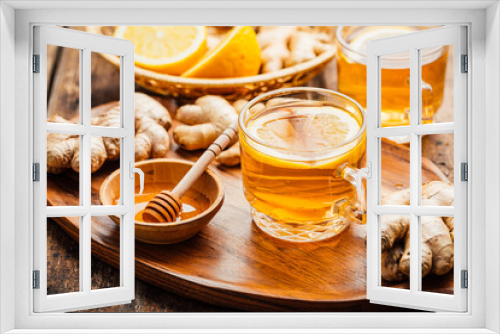 Fototapeta Naklejka Na Ścianę Okno 3D - Ginger tea with lemon on a wooden table