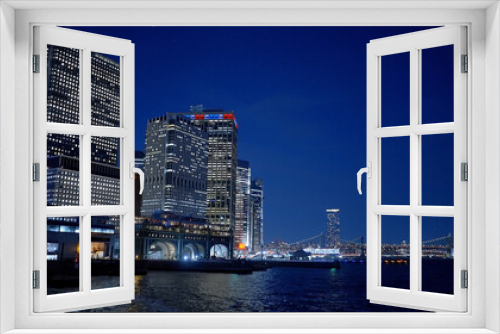 Fototapeta Naklejka Na Ścianę Okno 3D - The financial district of Downtown Manhattan at night - travel photography