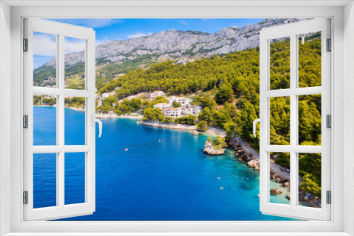 Fototapeta Naklejka Na Ścianę Okno 3D - Enjoy the view of Croatia's beach from above, where turquoise waters meet soft sands. Relax and find adventure in this beautiful vacation spot, captured in stunning aerial photography.