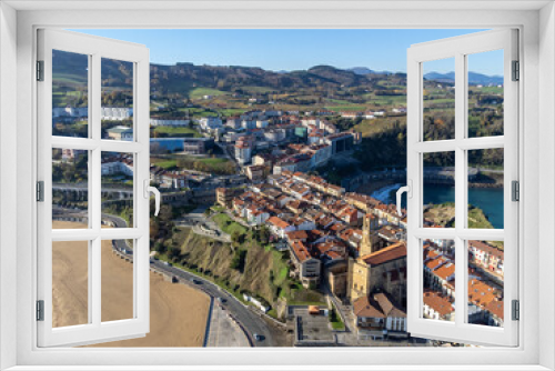 Sunny winter day in small fisherman's village Getaria near San Sebastian city, Basque Country coastline, Spain