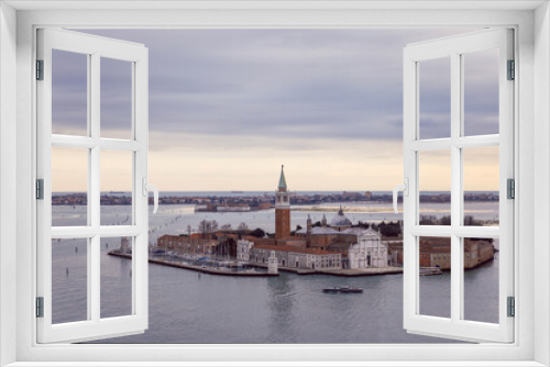 Fototapeta Naklejka Na Ścianę Okno 3D - View of the island of San Giorgio in the Venice lagoon and the Church Saint George Major with a red brick bell tower