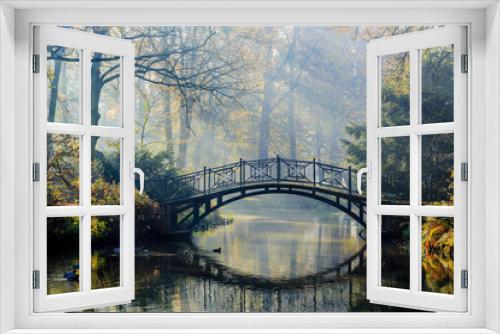 Fototapeta Naklejka Na Ścianę Okno 3D - Autumn - Old bridge in autumn misty park
