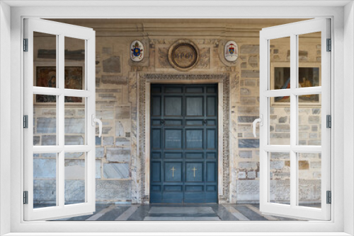 Fototapeta Naklejka Na Ścianę Okno 3D - Entrance door to the Basilica di Santa Maria in Trastevere, romanesque styled church in Trastevere, Rome	