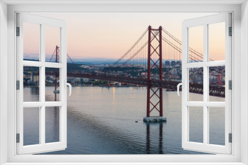 Fototapeta Naklejka Na Ścianę Okno 3D - Red Bridge April 25th in Lisbon early morning