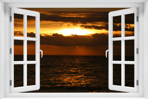 Fototapeta Naklejka Na Ścianę Okno 3D - Sunset in the sea and cloud of dark color image.