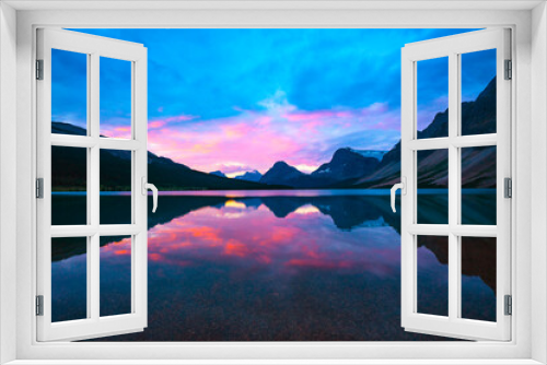 Fototapeta Naklejka Na Ścianę Okno 3D - Pink Sunrise Over Mountain Calm Lake