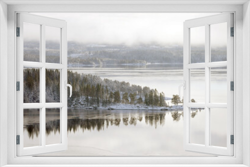 Fototapeta Naklejka Na Ścianę Okno 3D - Winter landscape the frozen shores of Jonsvatnet lake near Trondheim, Norway., Europe	