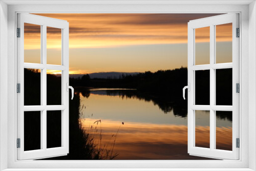Fototapeta Naklejka Na Ścianę Okno 3D - Sunset Glow Over The Lake