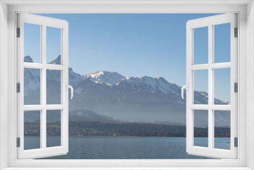 Fototapeta Naklejka Na Ścianę Okno 3D - View over the lake of Thun from Oberhofen in Switzerland