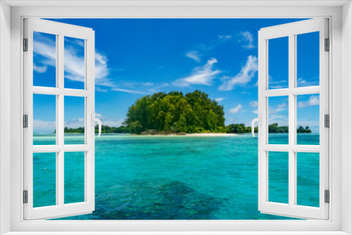 Fototapeta Naklejka Na Ścianę Okno 3D - View of Ngerechong Island from boat, clear water, blue ocean, white sand beach and tropical green trees, Rock Island Southern Lagoon, Palau