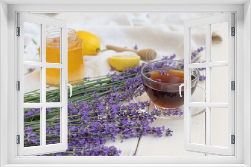 Fototapeta Naklejka Na Ścianę Okno 3D - Honey and lavender bouquets. Virus treatment concept. Wooden table.