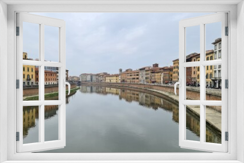 Fototapeta Naklejka Na Ścianę Okno 3D - Pisa, Italy - February 25, 2023: View of the medieval town of Pisa from bridge 