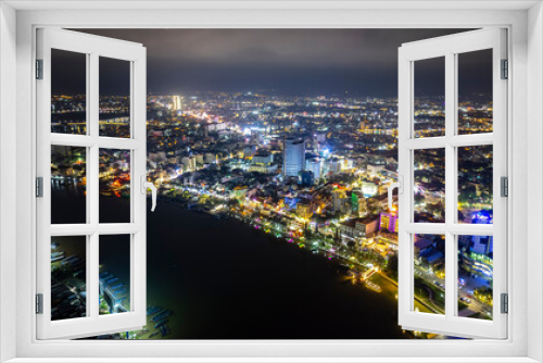 Fototapeta Naklejka Na Ścianę Okno 3D - Can Tho city, Can Tho, Vietnam at night, aerial view. This is a large city in Mekong Delta, developing infrastructure, population, and agricultural product trading center of Vietnam