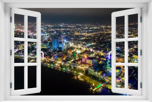 Fototapeta Naklejka Na Ścianę Okno 3D - Can Tho city, Can Tho, Vietnam at night, aerial view. This is a large city in Mekong Delta, developing infrastructure, population, and agricultural product trading center of Vietnam