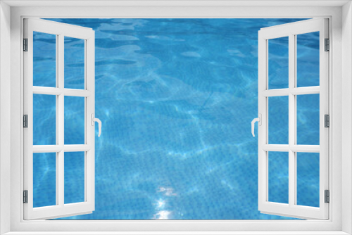 Fototapeta Naklejka Na Ścianę Okno 3D - Blue Water surface. Blue ripped water in swimming pool.
summer concept blue water elements.