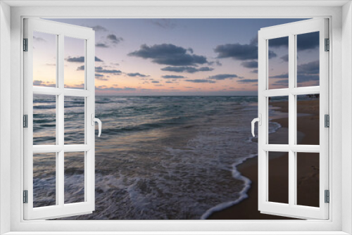 Fototapeta Naklejka Na Ścianę Okno 3D - Sunset over the sandy beach of Mediterranean sea in Israel