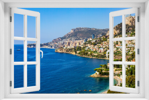 Fototapeta Naklejka Na Ścianę Okno 3D - High angle view of Monaco, Monte Carlo,  from Roquebrune, France. Panoramic view. Summer 2022. Horizontal image.