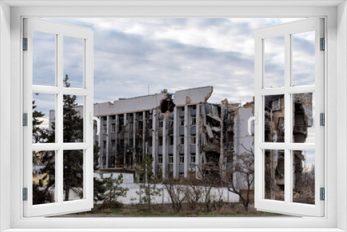 Fototapeta Naklejka Na Ścianę Okno 3D - destroyed and burned houses in the city Russia Ukraine war