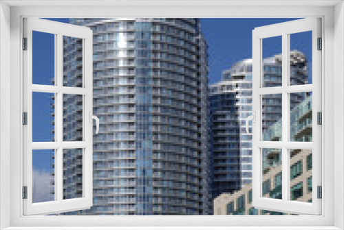 Modern curved highrise condo apartment buildings