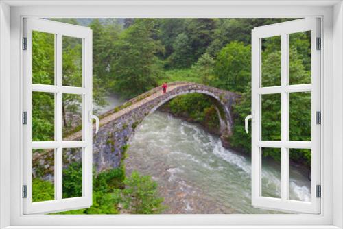 Fototapeta Naklejka Na Ścianę Okno 3D - Old stone bridges and women carrying tea.