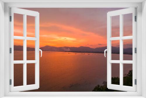 Fototapeta Naklejka Na Ścianę Okno 3D - .aerial view stunning sky in sunset above the sea..colorful cloud in bright sky of sunset above the ocean at Khao Khad Phuket. .Majestic sunset or sunrise landscape Amazing light of nature 