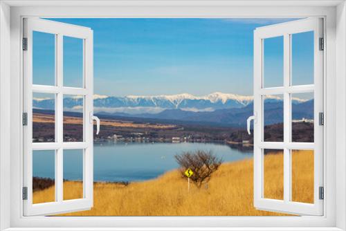 Fototapeta Naklejka Na Ścianę Okno 3D - 山中湖パノラマ台から山中湖に浮かぶ雪の南アルプス